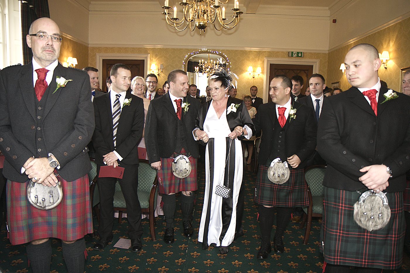 John Paul's own wedding day at Ross Priory in 2012 — the wedding party in kilts inside the priory